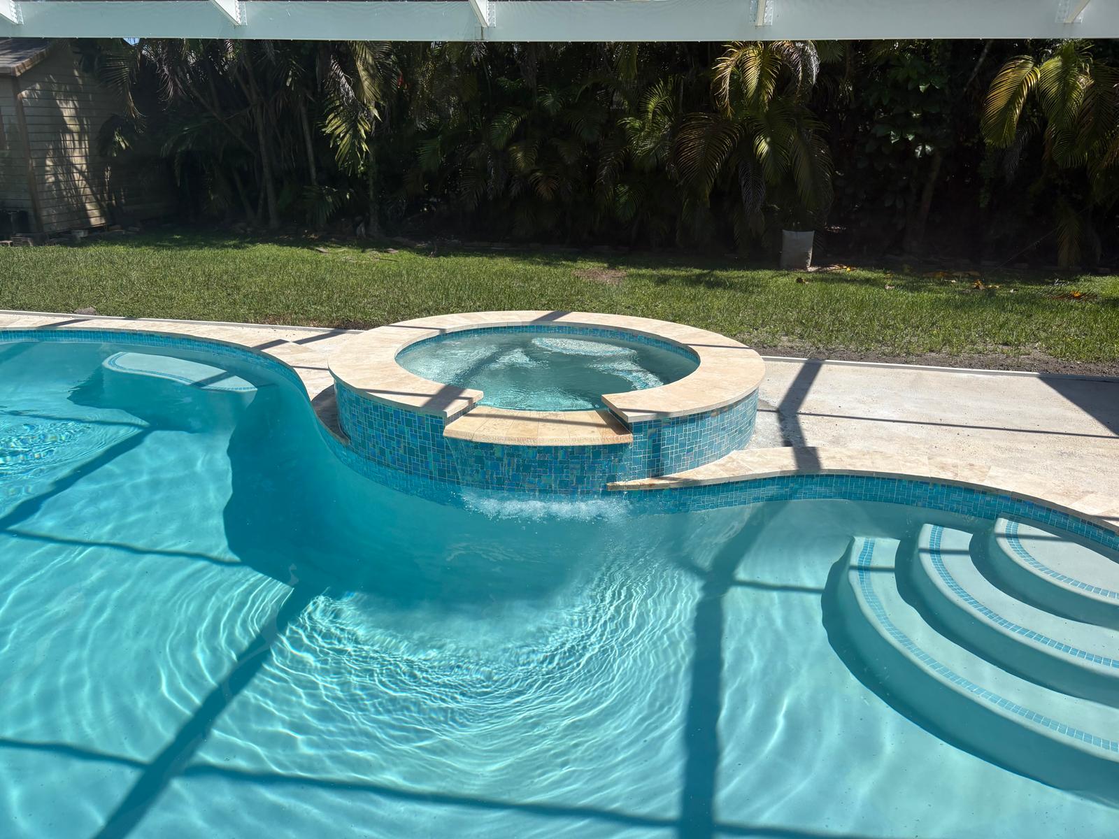 pool with round raised spa.